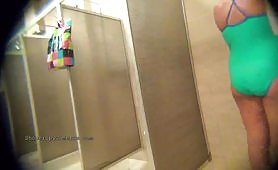 Hidden camera in a swimming pool shower 14