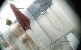 Spy camera in a swimming pool shower 17