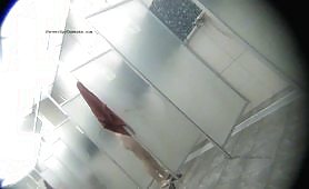 Spy camera in a swimming pool shower 23