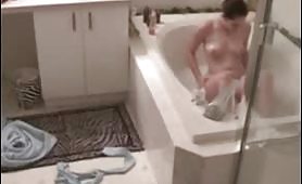 sister masturbates in bath